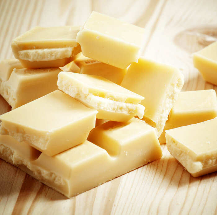 O Chocolate Branco Contém manteiga de cacau Cubos de Chocolate Branco